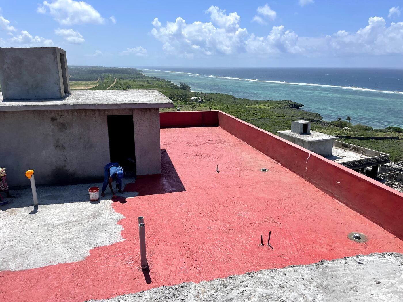 Rooftop slab waterproofing, utility shaft detail — coastal site